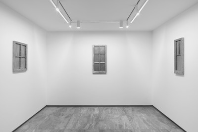 a wall . seven windows . four people . three trees . some clouds . one sun . - © Mennour